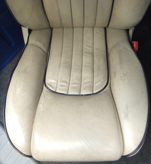 Worn Leather Care Seat Before
